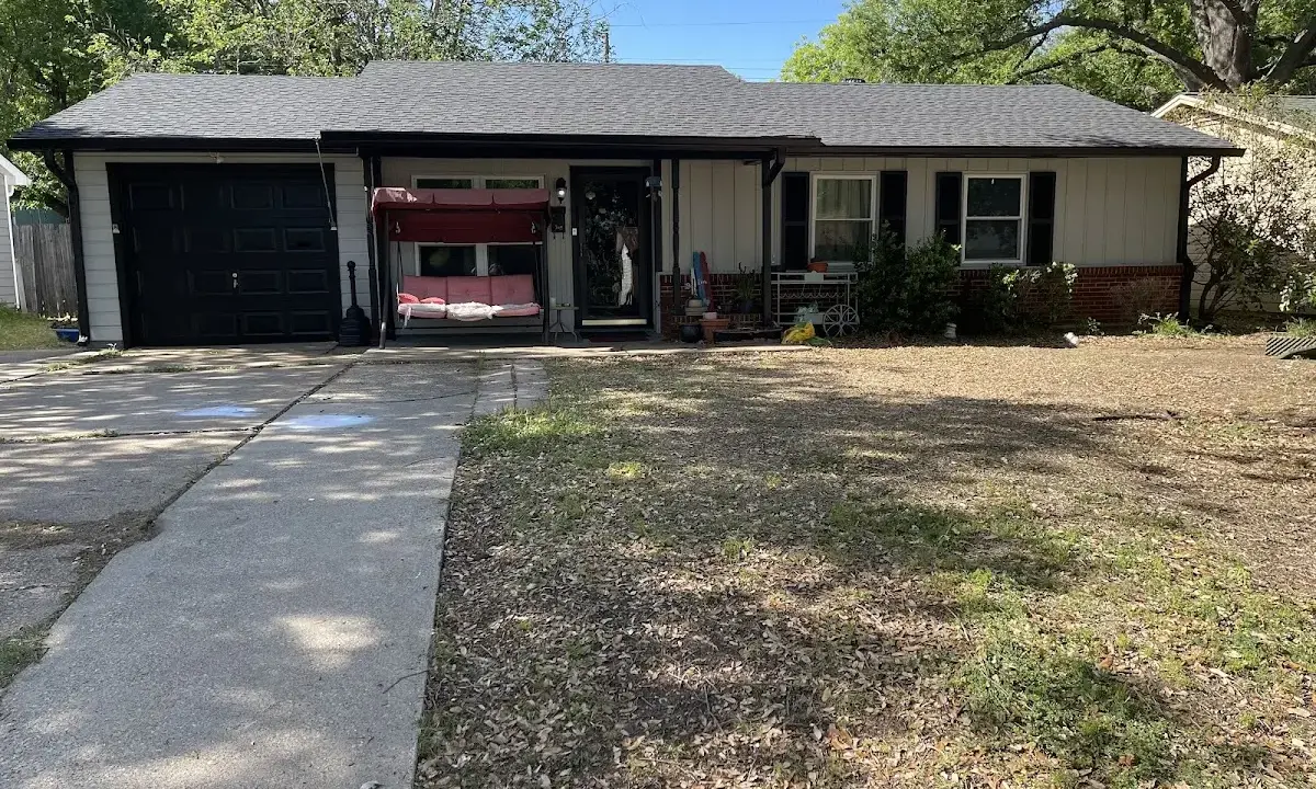 Asphalt Shingle Roof Repair crew at work on a residential roof in Veneta